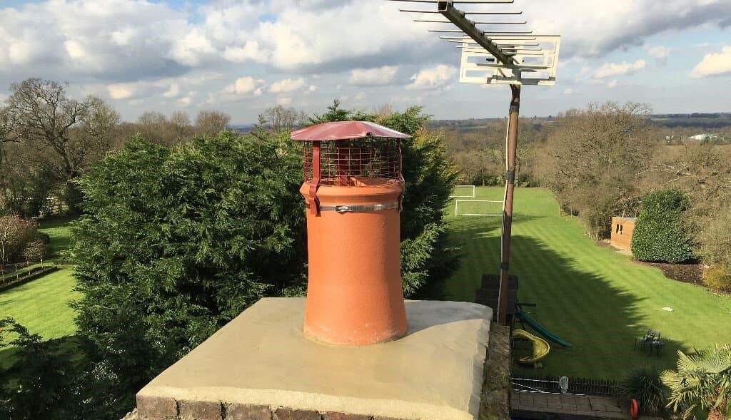 Survey view from roofline showing nearby properties