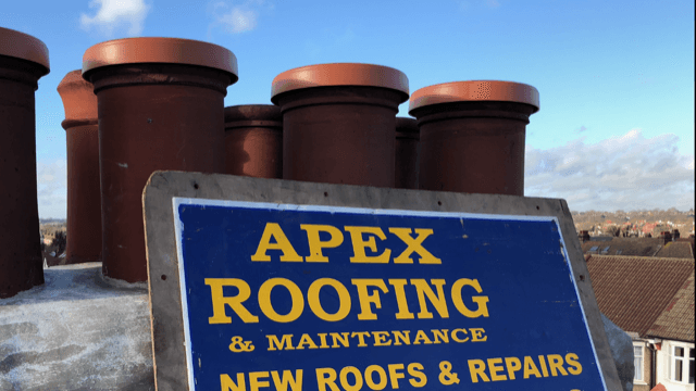 Restored chimney stack with matching pots and mortar
