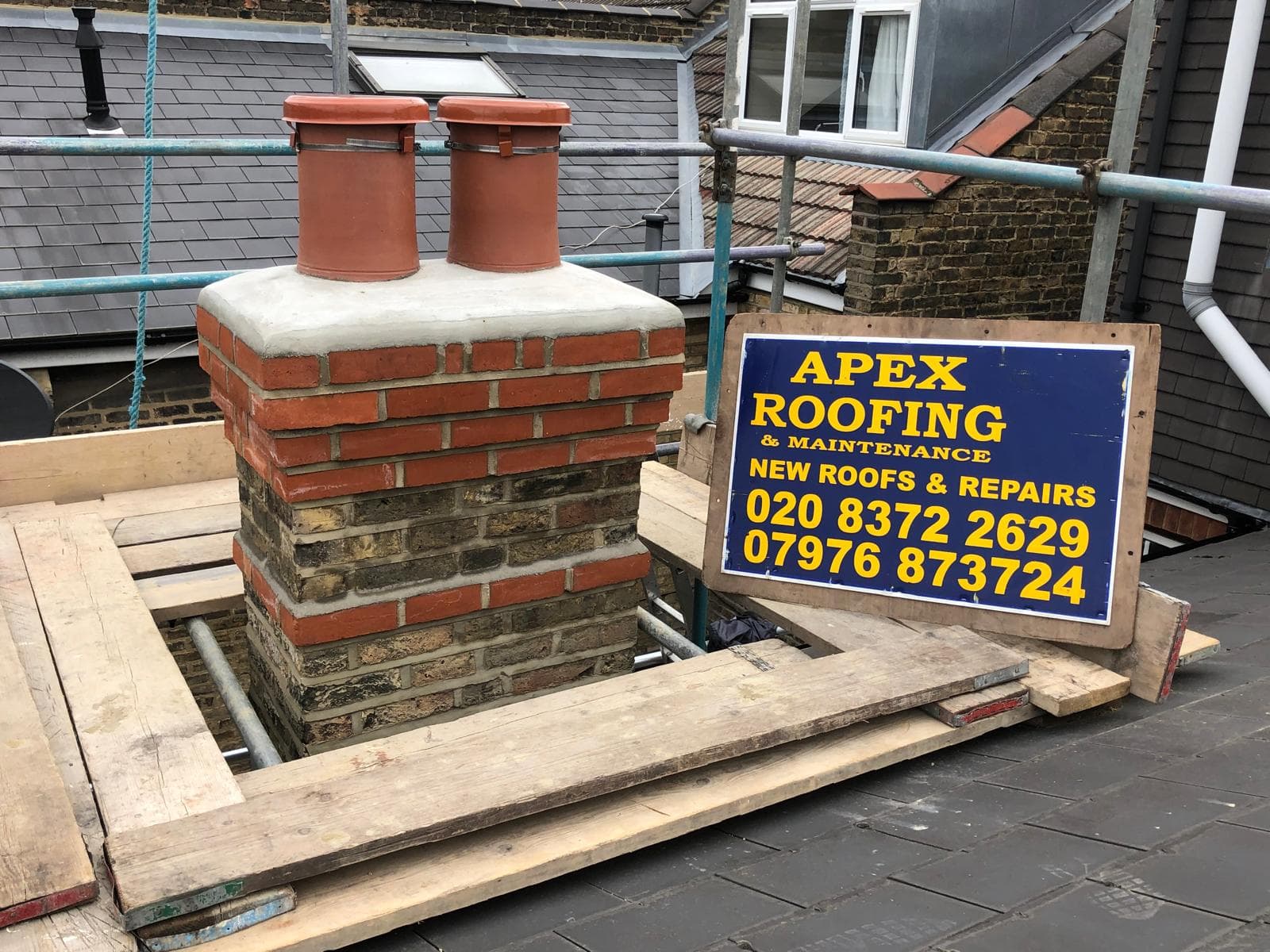 Chimney stack repointed with renewed mortar joints